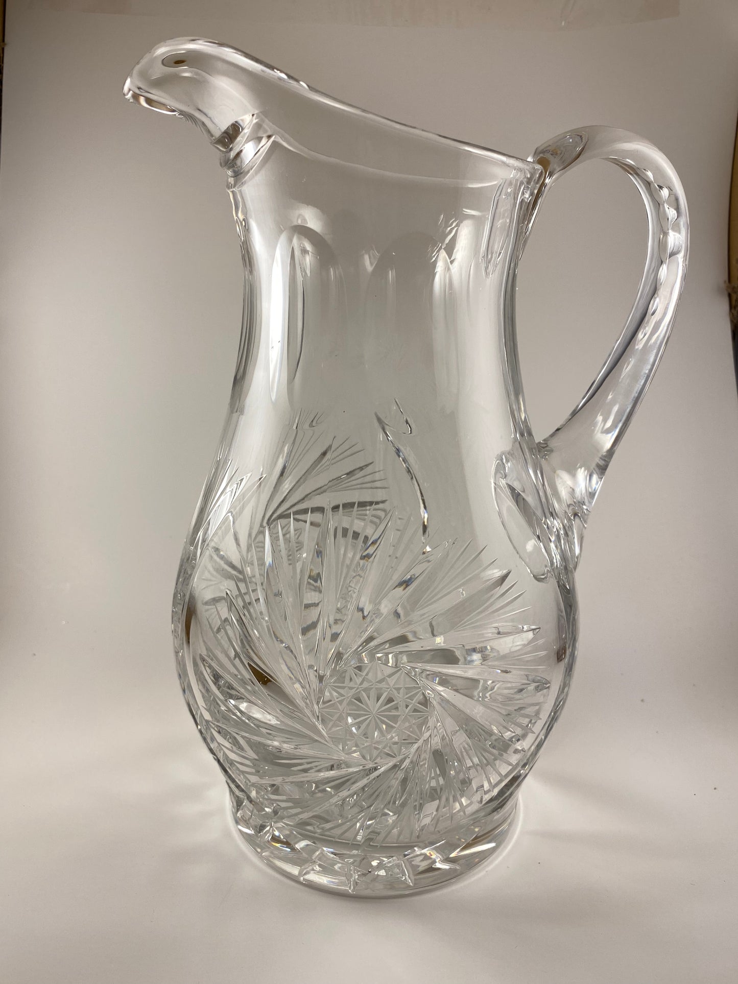 Eleanor by America Cut Leaded Crystal Pitcher and 8 matching hi ball glasses.