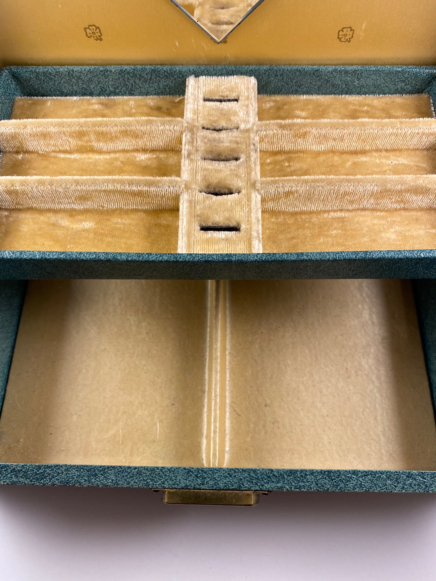 Teal jewelry box with gold velvet lining