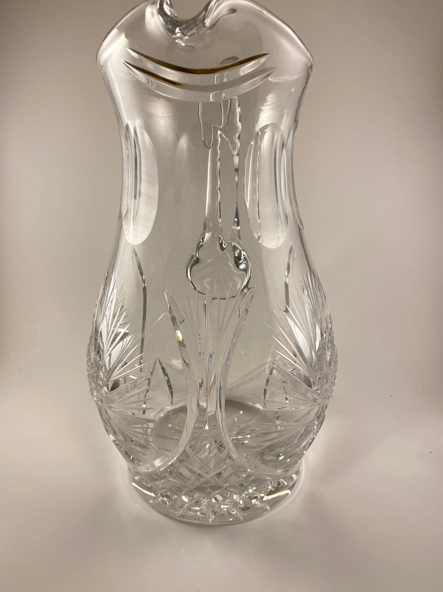 Eleanor by America Cut Leaded Crystal Pitcher and 8 matching hi ball glasses.