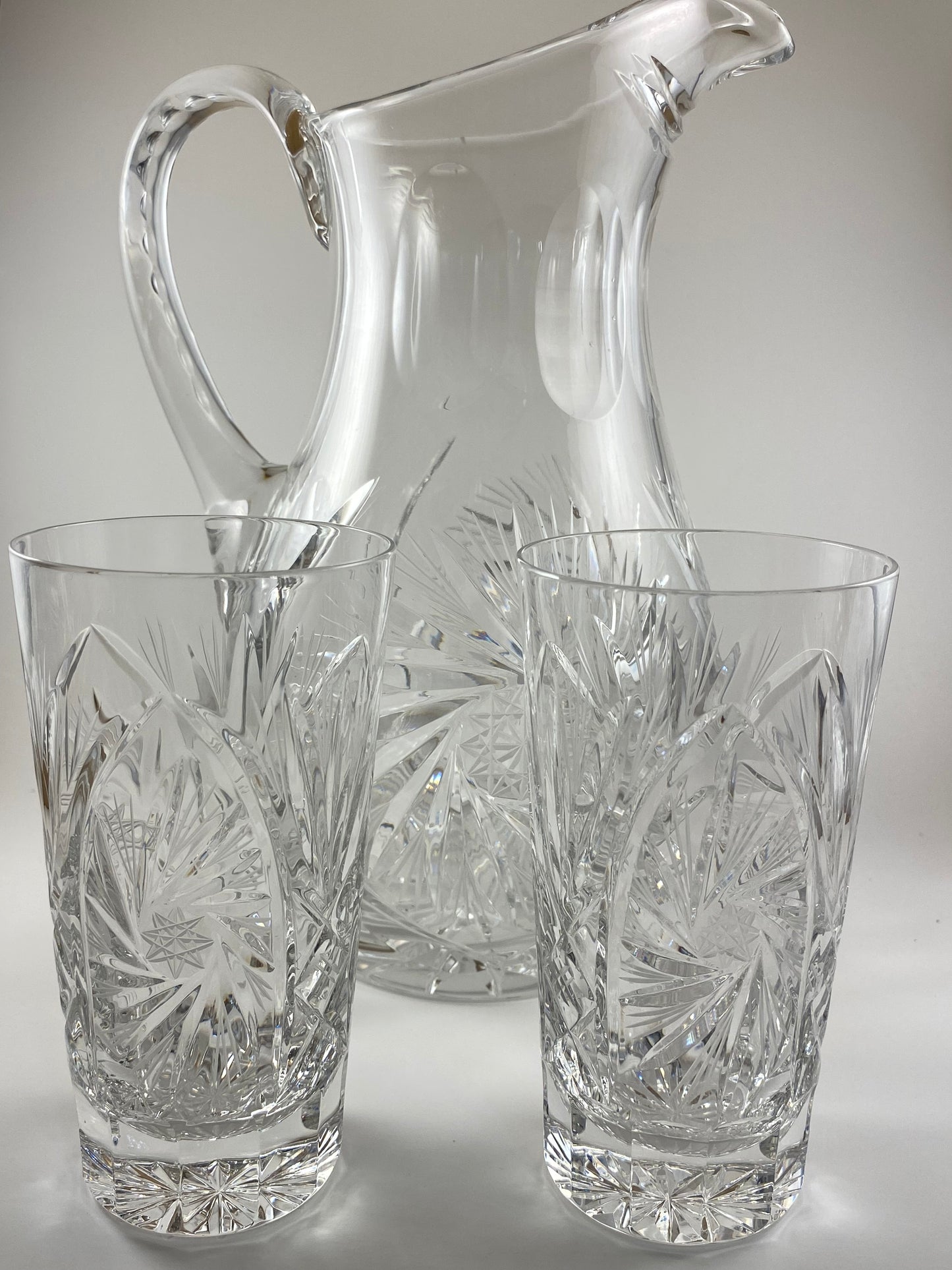 Eleanor by America Cut Leaded Crystal Pitcher and 8 matching hi ball glasses.