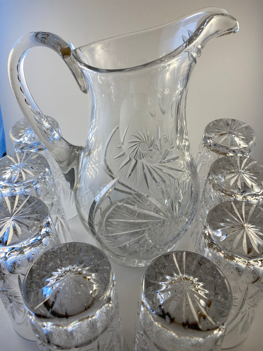 Eleanor by America Cut Leaded Crystal Pitcher and 8 matching hi ball glasses.